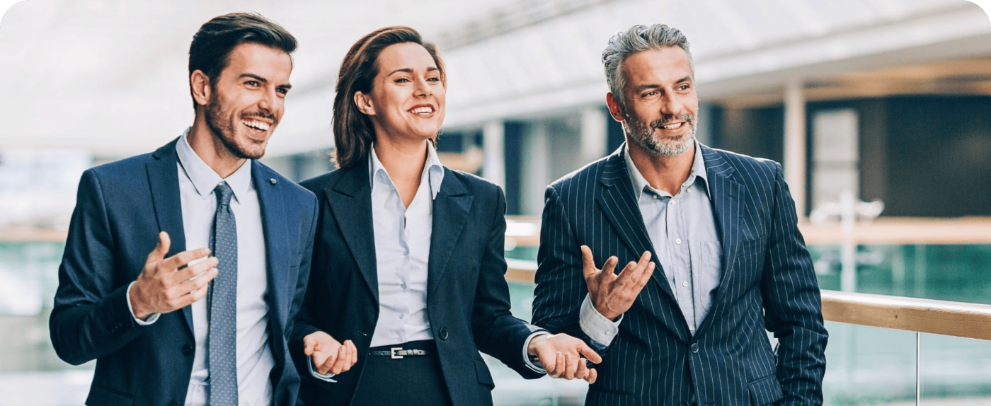 two business men and a women