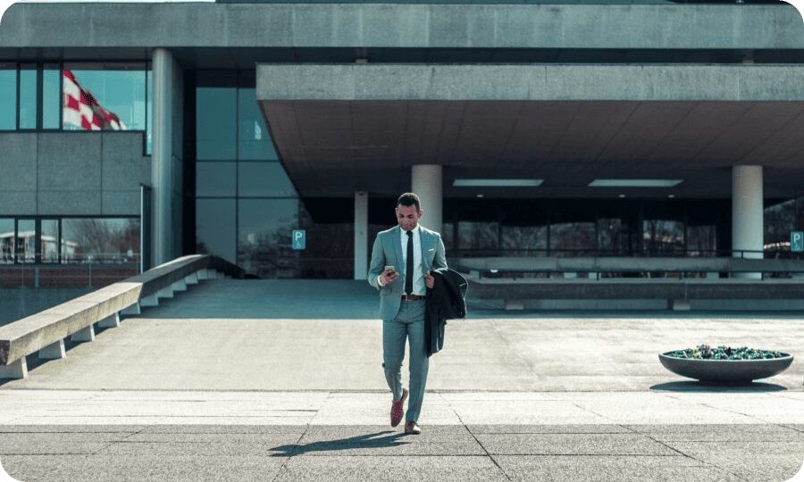 man walking out of office