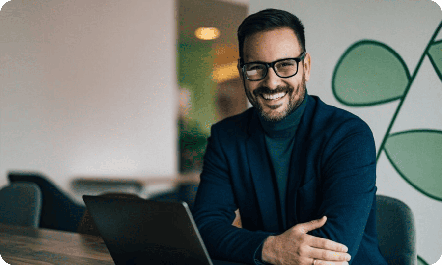 man with glasses smiling