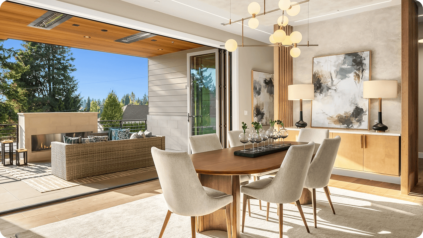 A stylish interior scene featuring artisan-crafted furniture, including a sculptural dining table and elegant seating, highlighting ARIID Home & Furniture's curated collection of luxury pieces designed to elevate and personalize your living space.