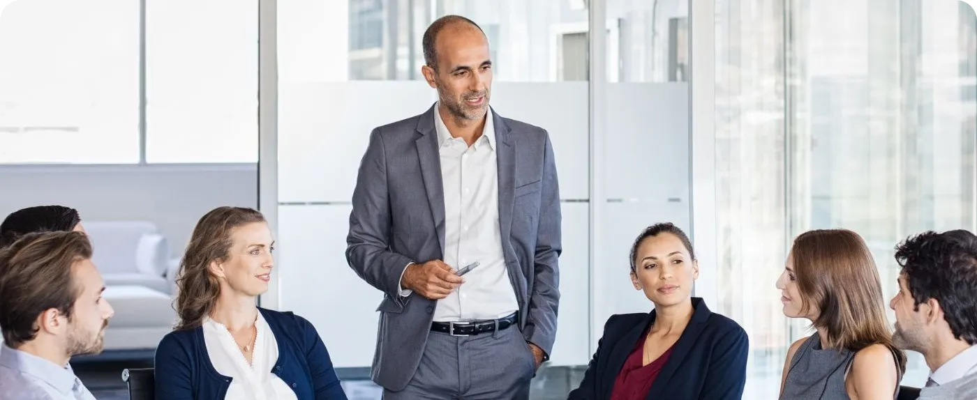 Team members discussing together in a meeting