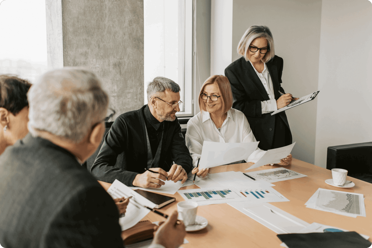 Business owner reviewing financial reports to understand why profit disappears as you scale.
