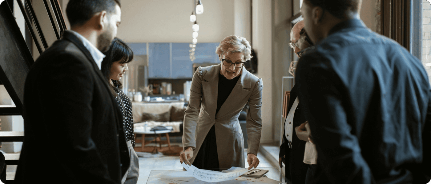 Talent acquisition specialist from OneAccord collaborating with a hiring manager to design a strategic recruitment plan in an office.