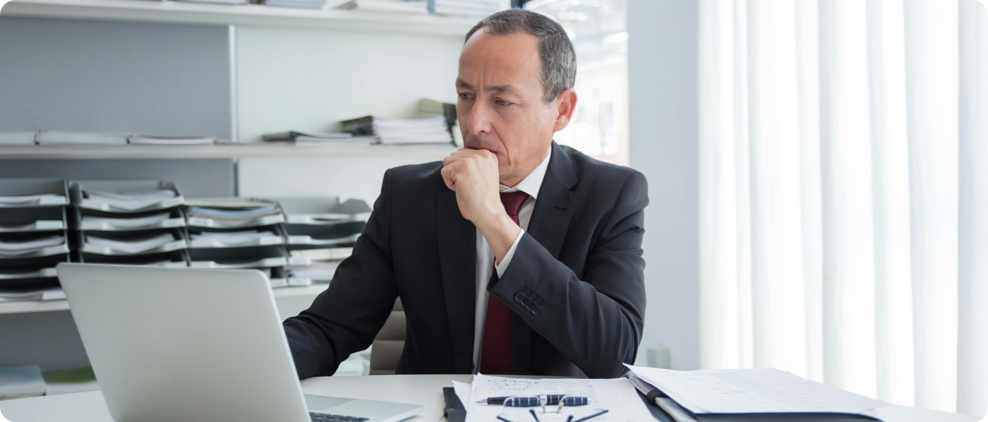 Overwhelmed business owner at center of every decision realizing the risk of owner dependency